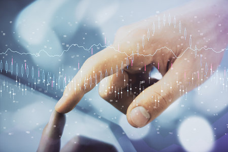 Multi exposure of mans hands holding and using a phone and financial chart drawing. Market analysis concept.の写真素材