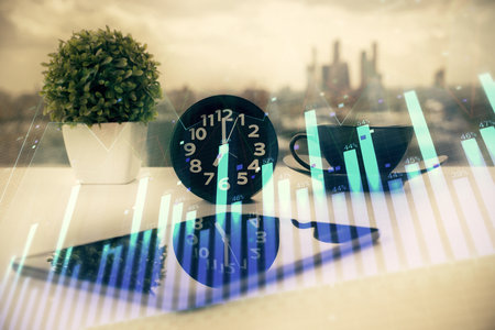Double exposure of forex graph drawing and cell phone background. Concept of financial data analysisの写真素材