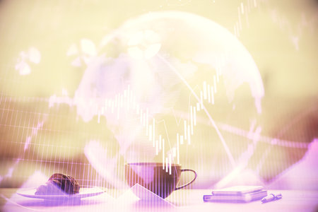 Double exposure of forex chart over coffee cup background in office. Concept of financial analysis and success.の写真素材