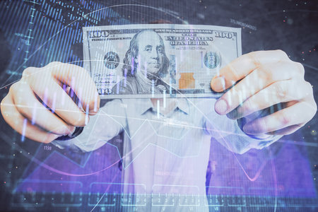 Multi exposure of forex graph drawing hologram and USA dollars bills and man hands. Technical Analysis concept.の写真素材