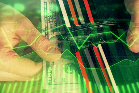 Multi exposure of forex graph drawing hologram and USA dollars bills and man hands. Technical Analysis concept.の写真素材