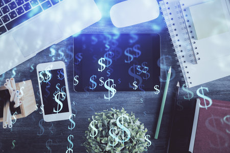 Double exposure of forex chart hologram over desktop with phone. Top view. Mobile trade platform concept.の写真素材