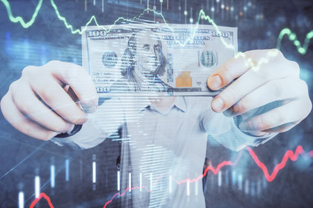 Multi exposure of forex graph drawing hologram and USA dollars bills and man hands. Technical Analysis concept.の写真素材