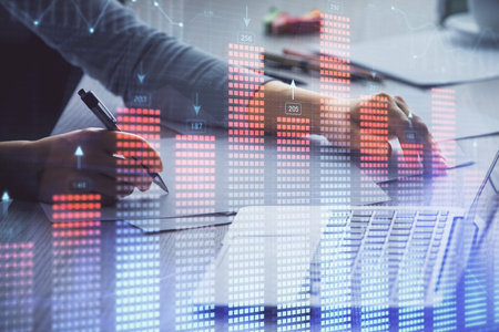 Double exposure of businesswoman hands typing on computer and forex chart hologram drawing. Financial analysis concept.の写真素材