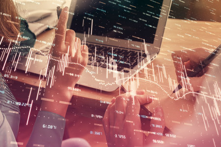 Double exposure of man and woman working together and forex chart hologram. Business concept....