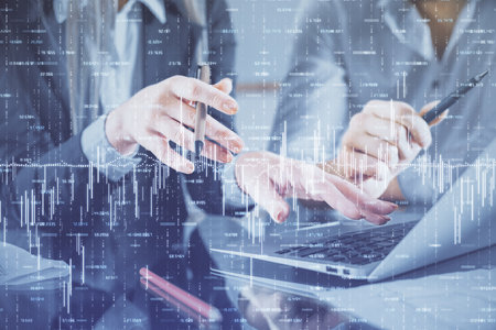 Multi exposure of man and woman working together and financial chart hologram. Business concept....