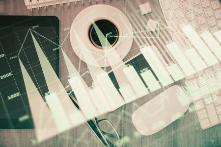 Multi exposure of forex graph hologram over desktop with phone. Top view. Mobile trade platform concept.の写真素材