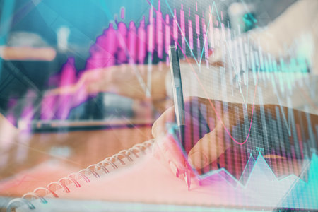 Double exposure of forex chart drawing over people taking notes background. Concept of financial analysisの写真素材
