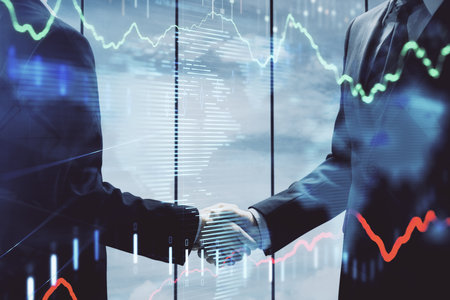 Double exposure of forex graph hologram and handshake of two men. Stock market concept.