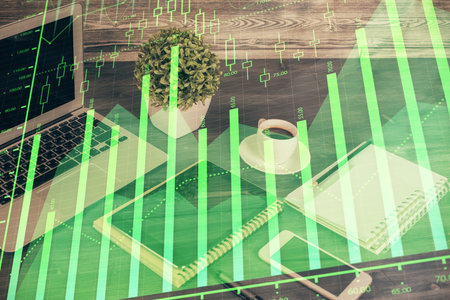 Double exposure of financial graph drawing and cell phone background. Concept of forex tradingの写真素材