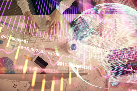 Double exposure of man and woman working together and financial chart hologram drawing. market analysis concept. Computer background. Top View.の写真素材