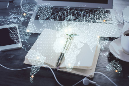 Double exposure of business theme drawings and desk with open notebook background. Concept of international marketの写真素材