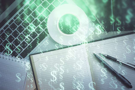 Stock market chart and top view computer on the table background. Double exposure. Concept of financial analysis.の写真素材
