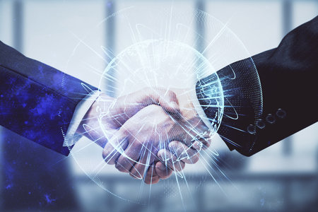 Double exposure of business theme hologram and handshake of two men. Success concept.の写真素材