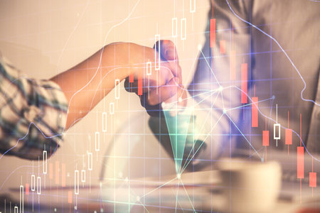 Double exposure of forex graph hologram and handshake of two men. Stock market concept.