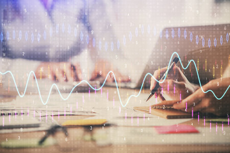 Multi exposure of woman hands typing on computer and forex chart hologram drawing. Stock market analysis concept.の写真素材
