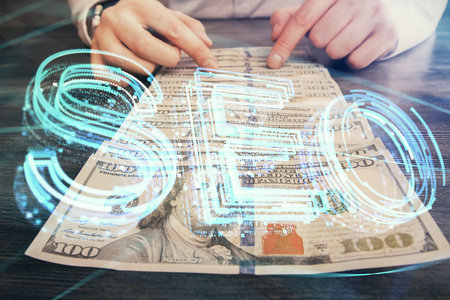 Multi exposure of seo drawing hologram and us dollars bills and man hands.の写真素材