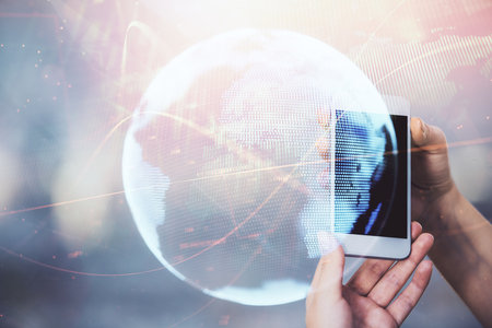 Double exposure of business theme sketch hologram and woman holding and using a mobile device.の写真素材