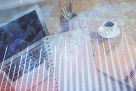 Double exposure of businesswoman hands typing on computer and forex chart hologram drawing. Financial analysis concept.の写真素材