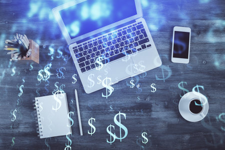 Double exposure of forex chart drawing over table background with computer. Concept of financial research and analysis. Top view.