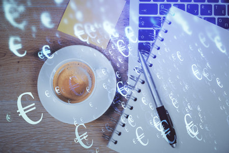 Double exposure of forex chart drawing over table background with computer. Concept of financial research and analysis. Top view.の写真素材