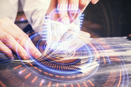 Double exposure of technology drawing hologram and us dollars bills and man hands. Data conceptの写真素材