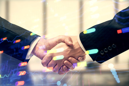 Double exposure of data theme hologram and handshake of two men. Partnership in IT industry concept.の写真素材