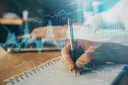 Double exposure of forex chart drawing over people taking notes background. Concept of financial...