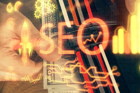 Multi exposure of seo drawing hologram and us dollars bills and man hands.