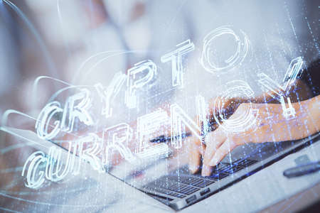 Double exposure of woman hands typing on computer and crypto market theme hologram drawing....
