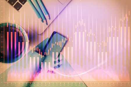 Double exposure of forex graph drawing over desktop background with computer. Concept of financial analysis. Top view.の写真素材