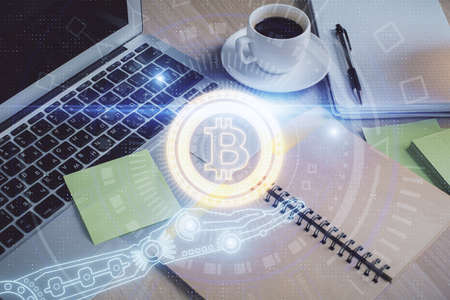 Double exposure of crypto technology drawing and desktop with coffee and items on table background....