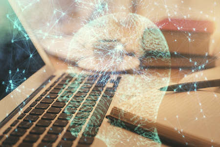 Double exposure of brain drawing and desktop with coffee and items on table background. Concept of research.の写真素材