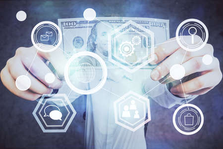 Multi exposure of social network theme drawing hologram and USA dollars bills and man hands.