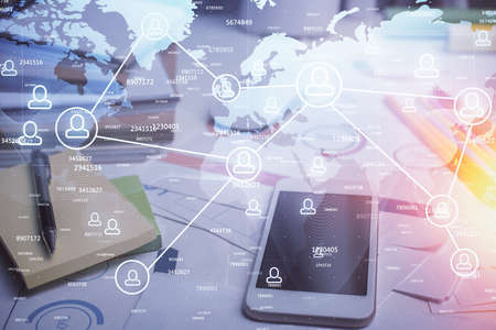 Double exposure of social network theme drawing and cell phone background. Concept of people...