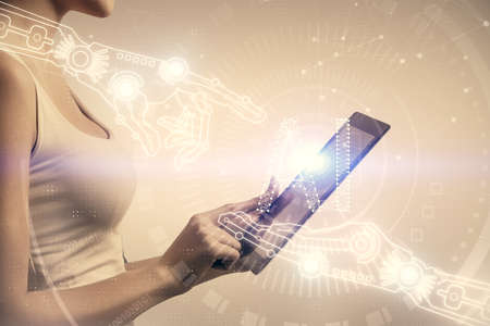 Double exposure of technology sketch hologram and woman holding and using a mobile device.