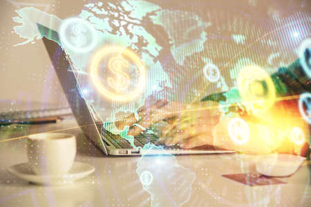 Double exposure of businesswoman hands typing on computer and forex graph hologram drawing....