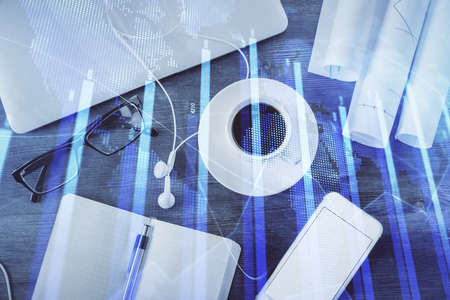 Multi exposure of forex graph drawing over desktop background with computer. Concept of financial...
