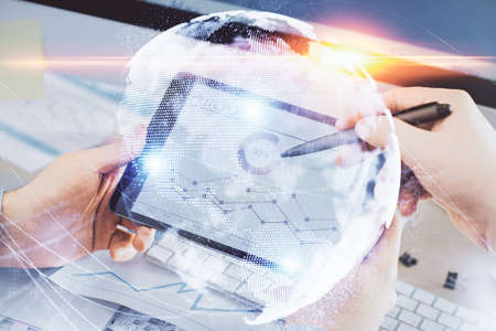 Double exposure of mans hands holding and using a phone and international business theme drawing.の写真素材