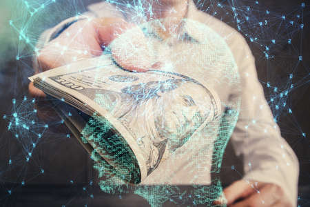 Multi exposure of brain drawing hologram and us dollars bills and man hands. Ai invest conceptの写真素材