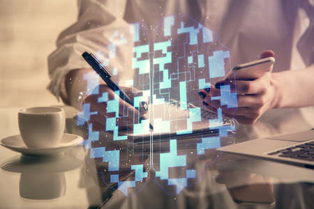 Double exposure of technology sketch hologram and woman holding and using a mobile device. Ai conceptの写真素材