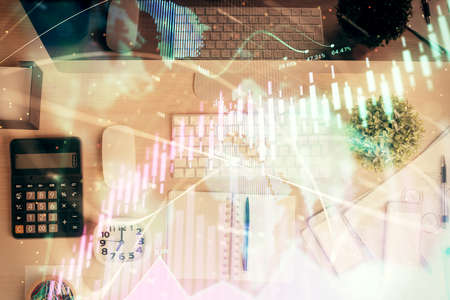 Multi exposure of forex graph drawing over desktop background with computer. Concept of financial...