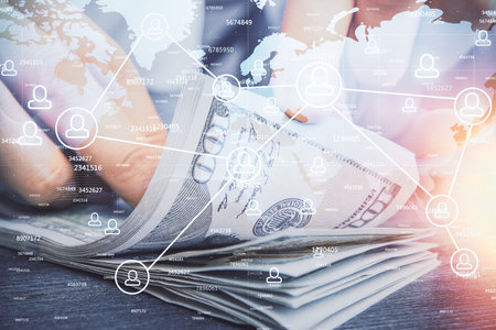Multi exposure of social network theme drawing hologram and USA dollars bills and man hands.の写真素材