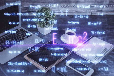 Double exposure of formula drawing and mobile phone background. Concept of education