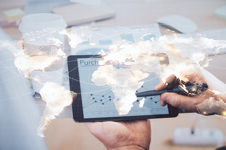 Double exposure of mans hands holding and using a phone and international business theme drawing.の写真素材