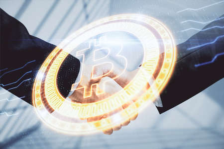 Double exposure of blockchain hologram and handshake of two men. Crypto business concept.の写真素材
