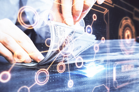 Multi exposure of social network theme drawing hologram and USA dollars bills and man hands.