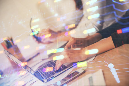 Double exposure of woman hands working on computer and data theme hologram drawing. Tech concept.