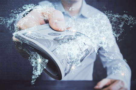 Multi exposure of social network theme drawing hologram and USA dollars bills and man hands.の写真素材