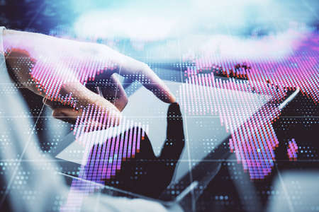 Double exposure of mans hands holding and using a phone and international business theme drawing.